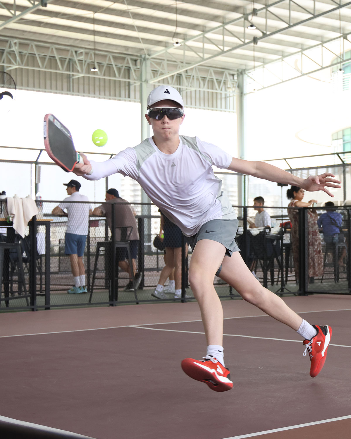 Portrait of Austin Romaguera on the pickleball court